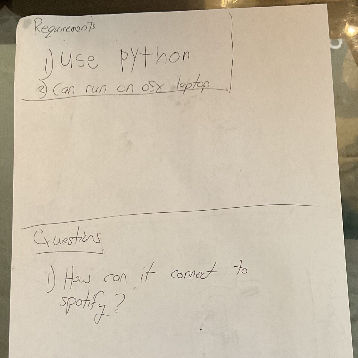 The requirements page: "Requirements: 1) use python, 2) can run on osx laptop. Questions: 1) How can it connect to spotify?"